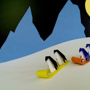 Tobogganing Penquins Tobogganing Penquins