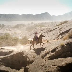Horseback rider up Mount Bromo Volcano Horseback rider up Mount Bromo Volcano