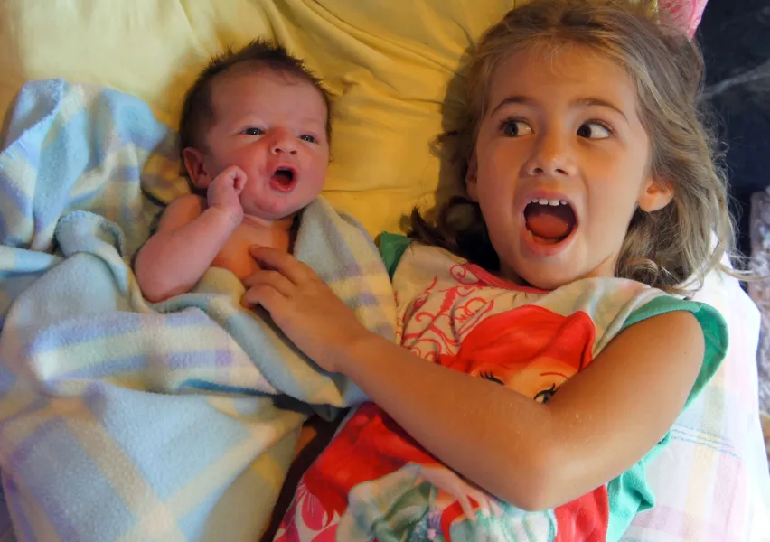 4 days old greets sister 4 days old greets sister