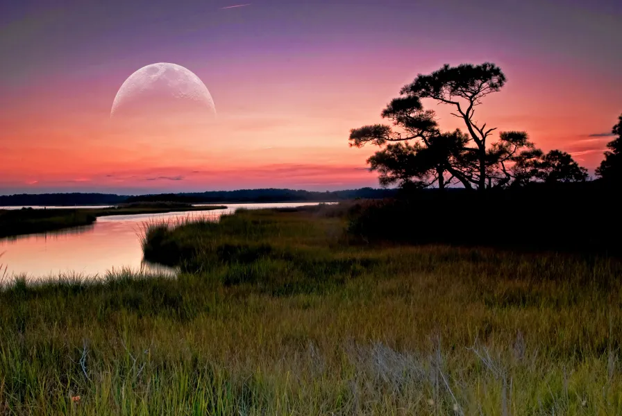 Sunset over Assawoman Bay as the moon rises. Sunset over Assawoman Bay as the moon rises.