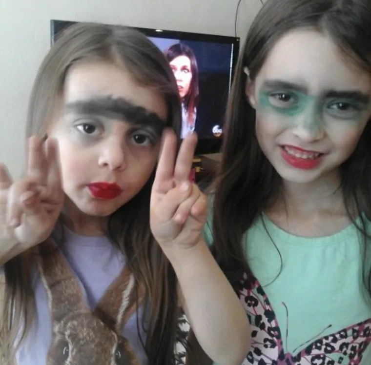 Girls putting on makeup  Girls putting on makeup