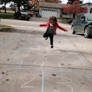 Amelia learning hopscotch