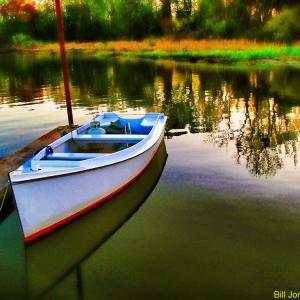 Boat at dock, sunset on the Potomac River