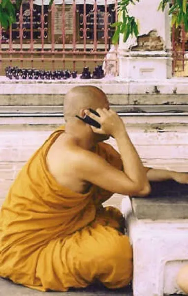 Monk on a cell phone