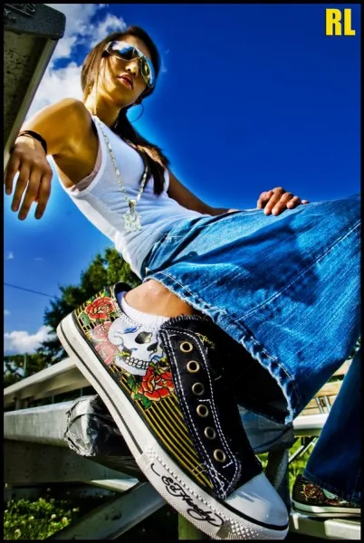 her Ed Hardy kicks...