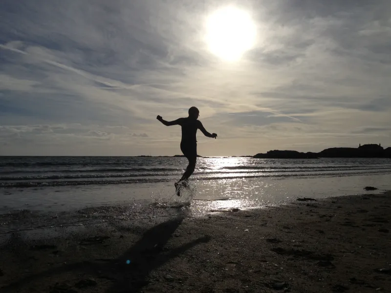 Skim Boarding at sunset