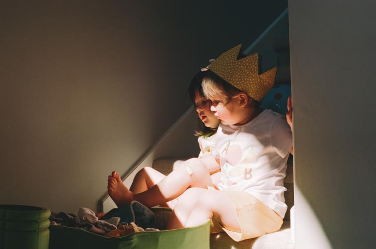 sisters sharing sunlight 