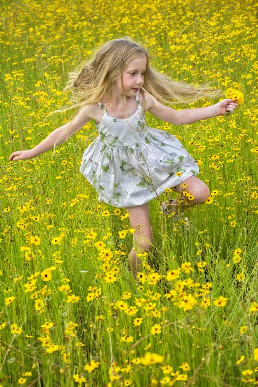 Girl with wildflowers