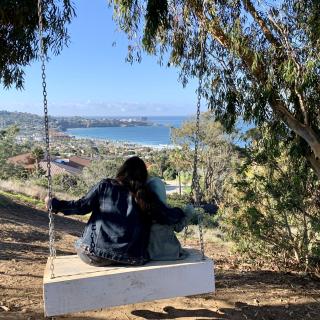 Hidden swing overlooking the Pacific and a quiet mommy-daughter moment. 