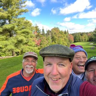 Phi Sigs golfing in Old Forge 